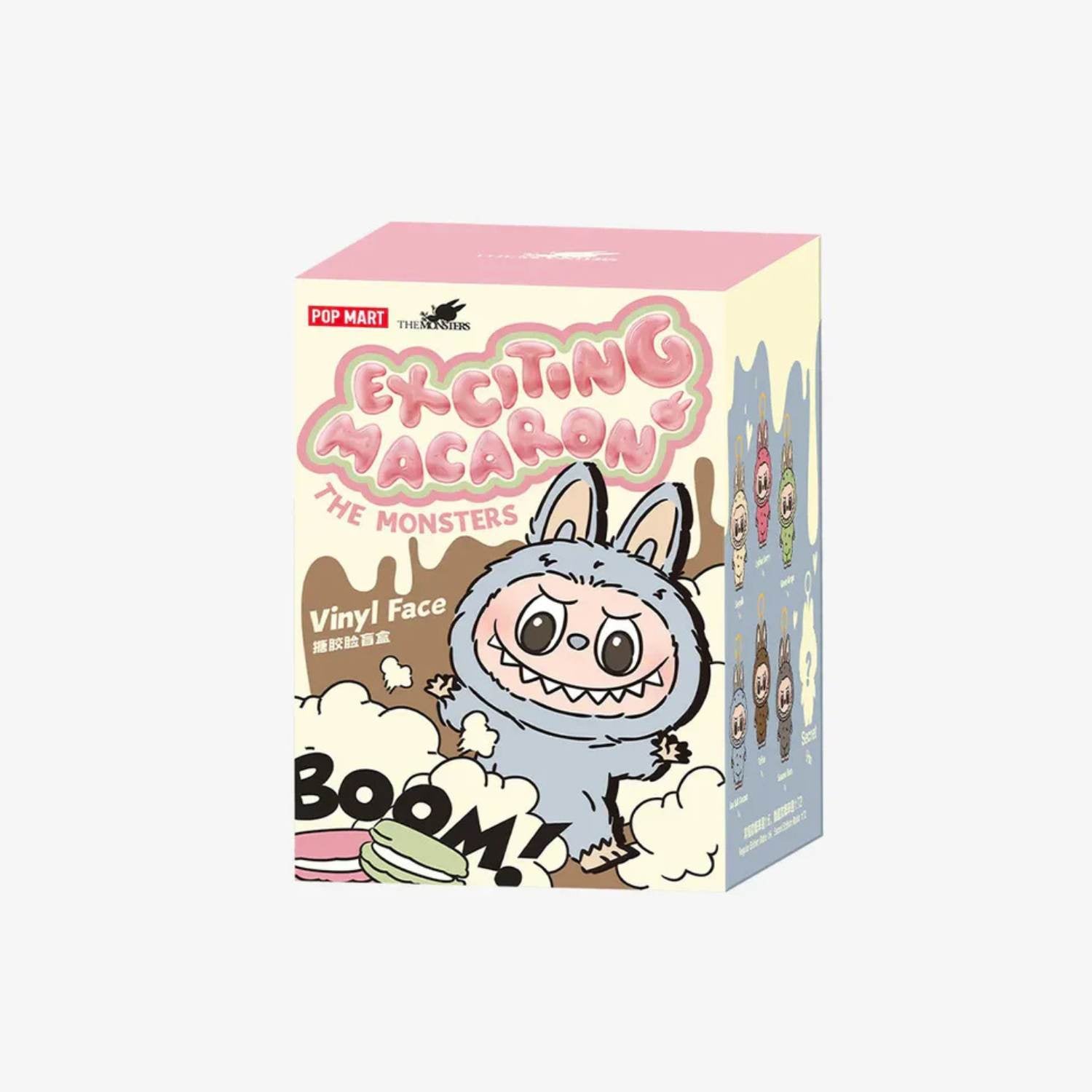 Box of 'Exciting Macaron The Monsters' vinyl figures with cartoon character on a white background