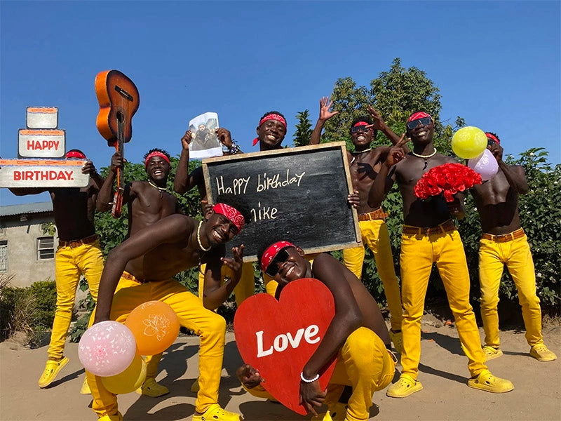 African greeting dancers posing